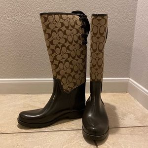 Coach tall rain boots with laced backs. Only worn 1-2 time EUC. No box.